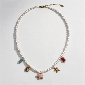 natural pearl beaded choker necklace with ocean themed enamel starfish & shell charms