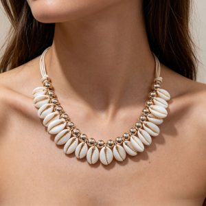 natural cowrie shell multi cord bib necklace with gold spacer beads